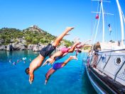 Jumping in the blue waters at Kekova