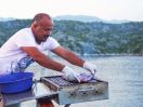 Fish on the BBQ on a blue cruise